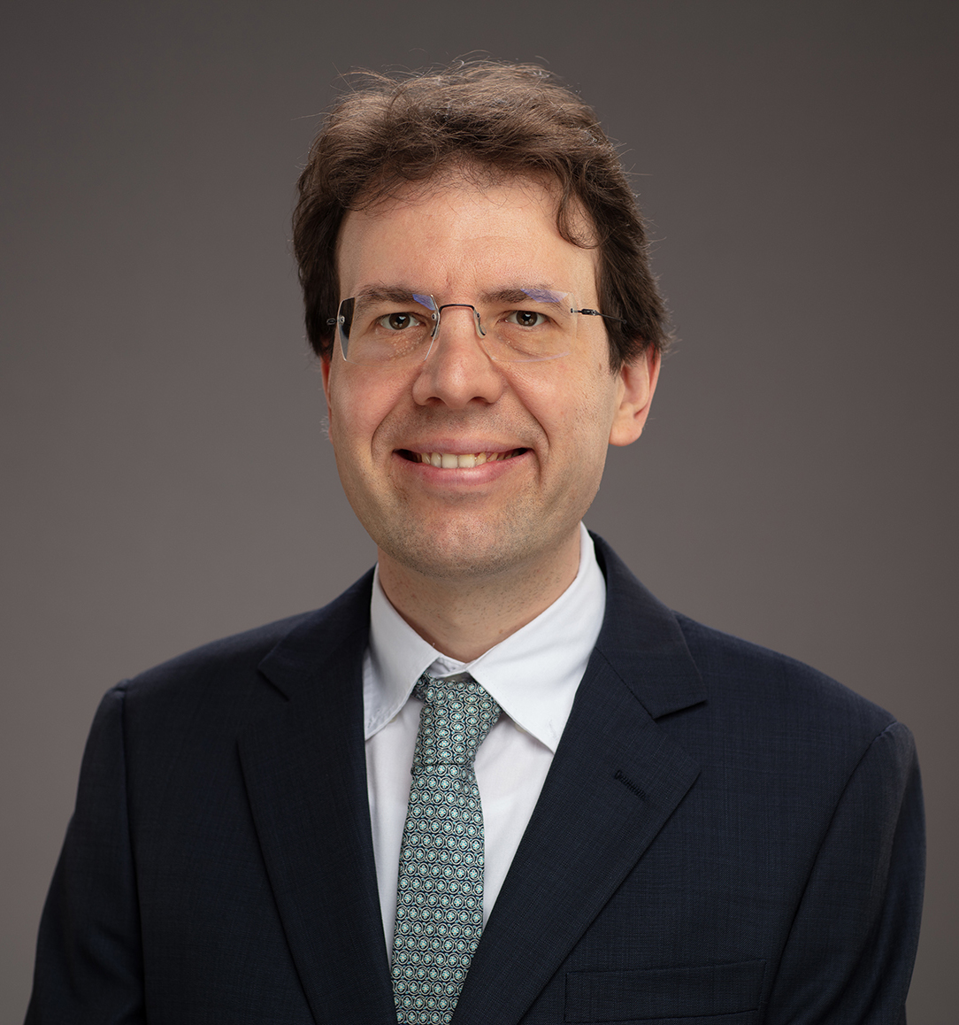 Headshot photograph of Jörg Matthias Determann